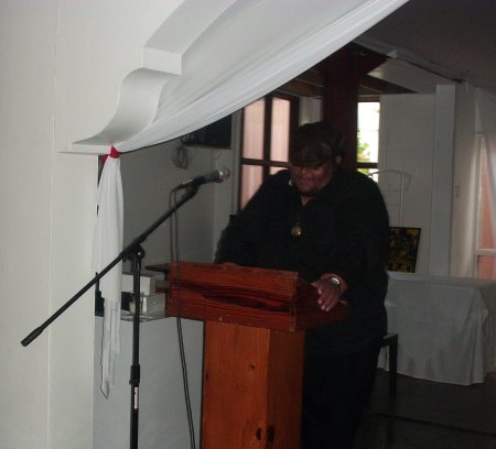 Angelo Bissessarsingh tickles the crowd's collective funny bone with his short story, "Lady Maudie".